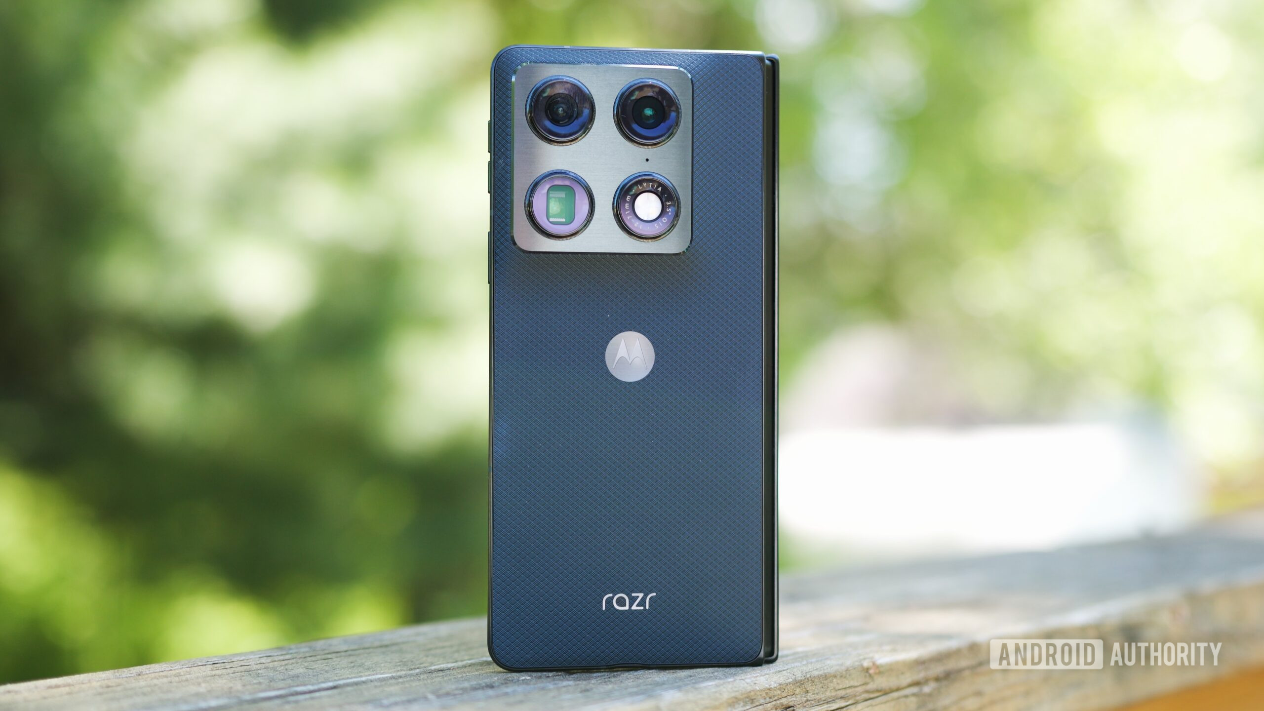 The Motorola Razr Fold standing upright outside.