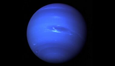 How does a planet 4.5 billion kilometres from the Sun, where daylight is roughly 900 times dimmer than on Earth, whip up the fastest winds in the entire solar system?