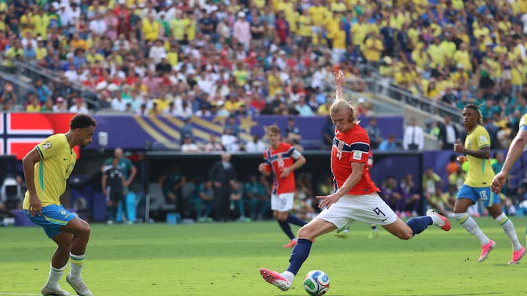 Norway's Erling Haaland (9) shoots and scores their second goal during the World Cup round of 16