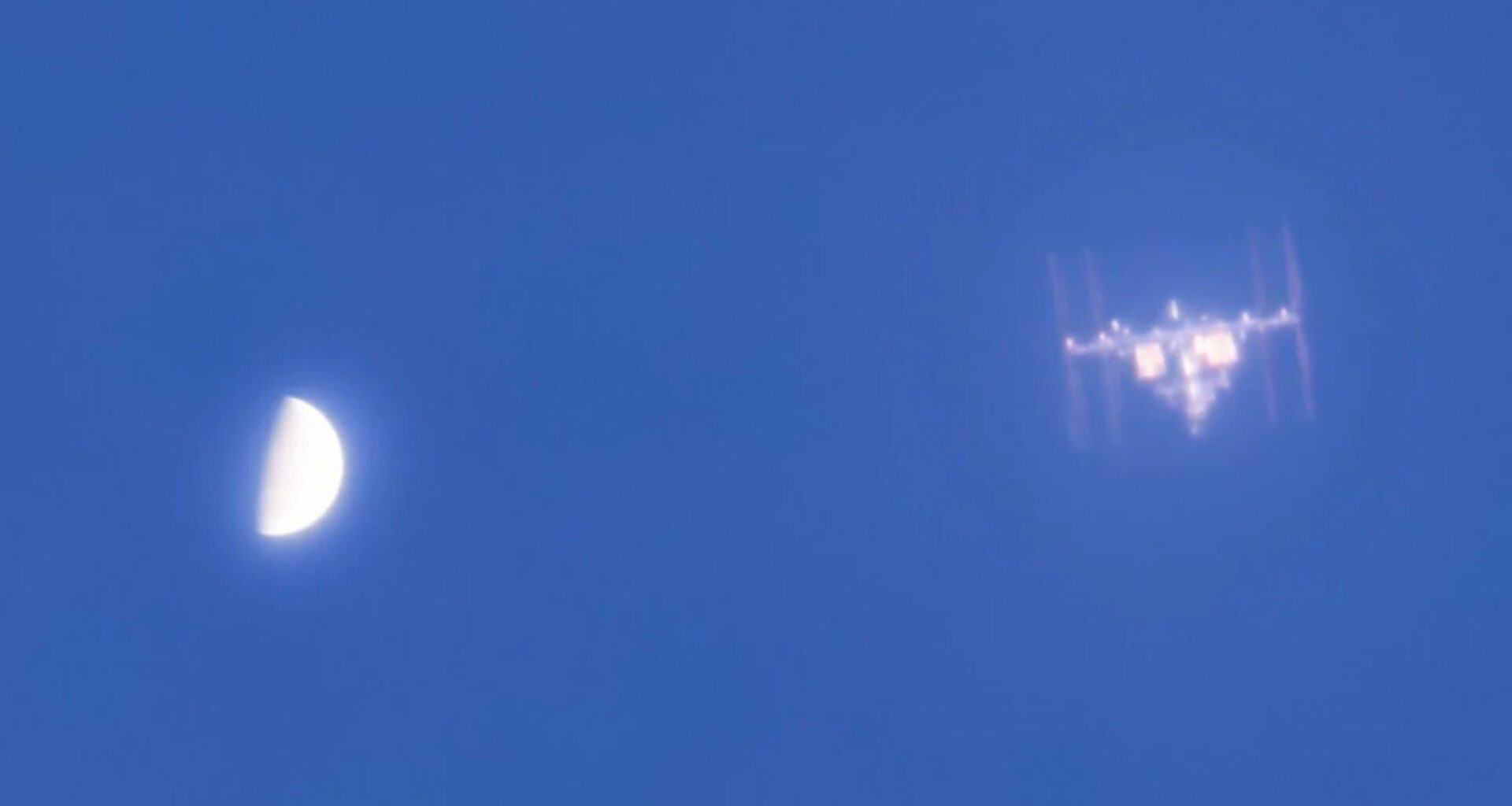 ISS meets Venus in incredible daylight photo photo of the day for July 28, 2026