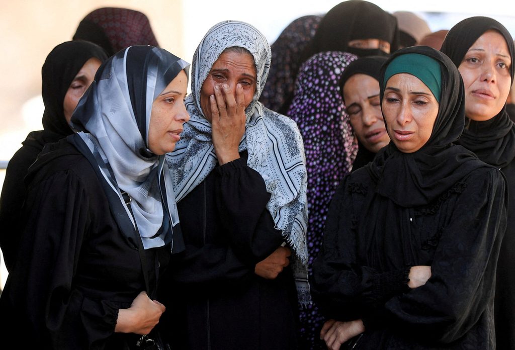 Mourners participate in the funeral of Palestinians in Gaza City