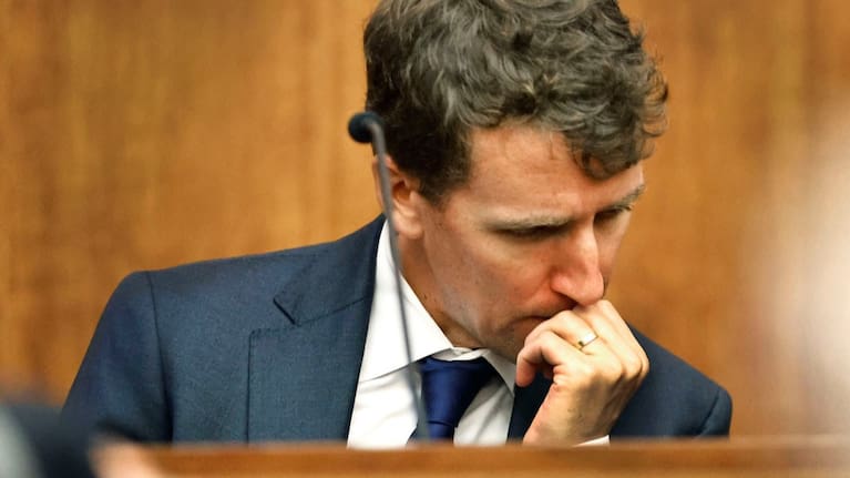 Patrick Clancy reacts as images of himself and his children on vacation a month before they were killed is shown in the courtroom. (Source: Greg Derr/The Patriot Ledger via AP, Pool)
