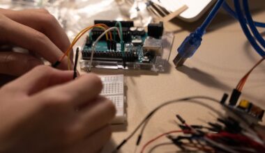 The software that landed men on the Moon was not loaded onto the Apollo Guidance Computer so much as woven into it, with women at a Raytheon plant threading wire through or around thousands of tiny magnetic rings by hand, one pass for a one and one miss for a zero, until the whole program was a physical textile