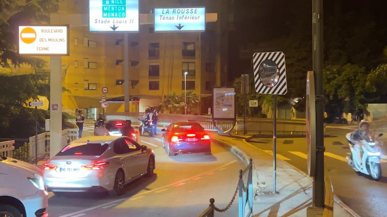Police stop motorists after a blast from an explosive device injured multiple people at a residential building in Monaco, late Monday, June 29, 2026.