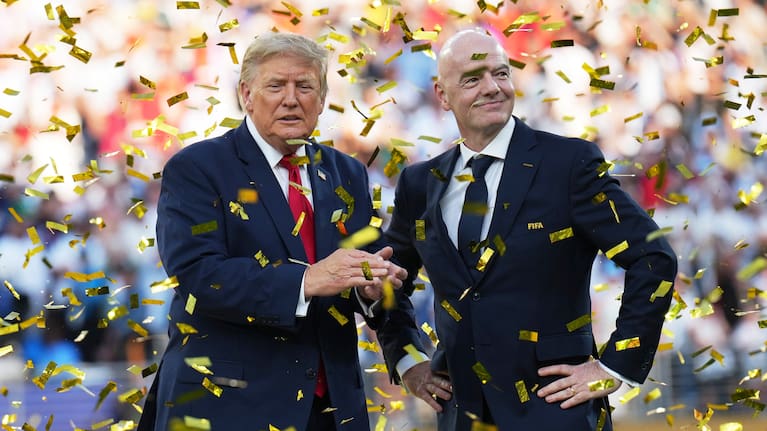 President Donald Trump, left, and FIFA President Gianni Infantino watch confetti fall at the conclusion of the World Cup championship final soccer match between Spain and Argentina in East Rutherford