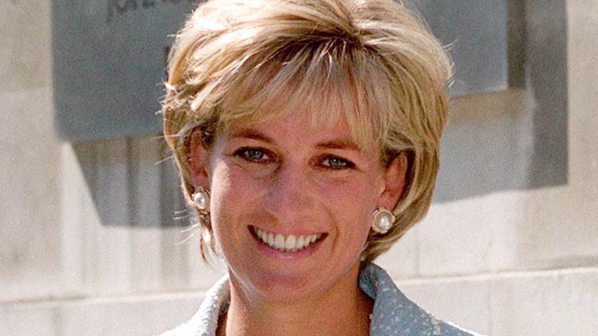 Princess Diana leaving the British Lung Foundation holding a bouquet of the first rose named after her.