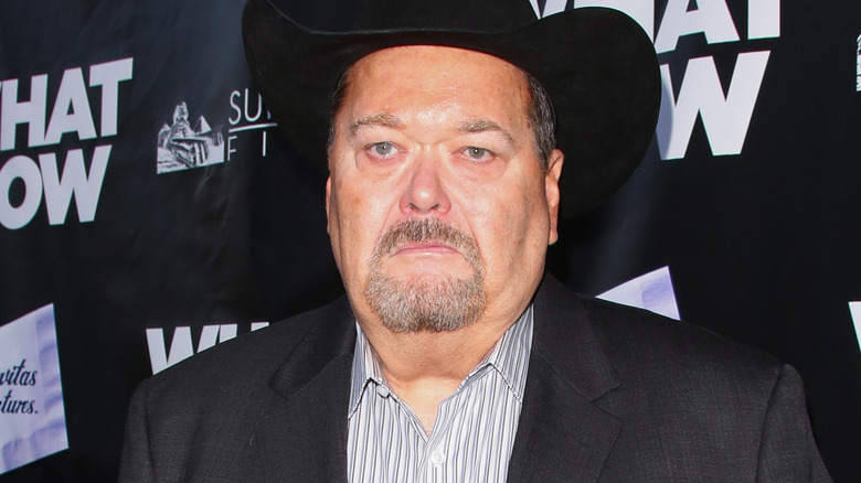 Jim Ross wearing a black cowboy hat