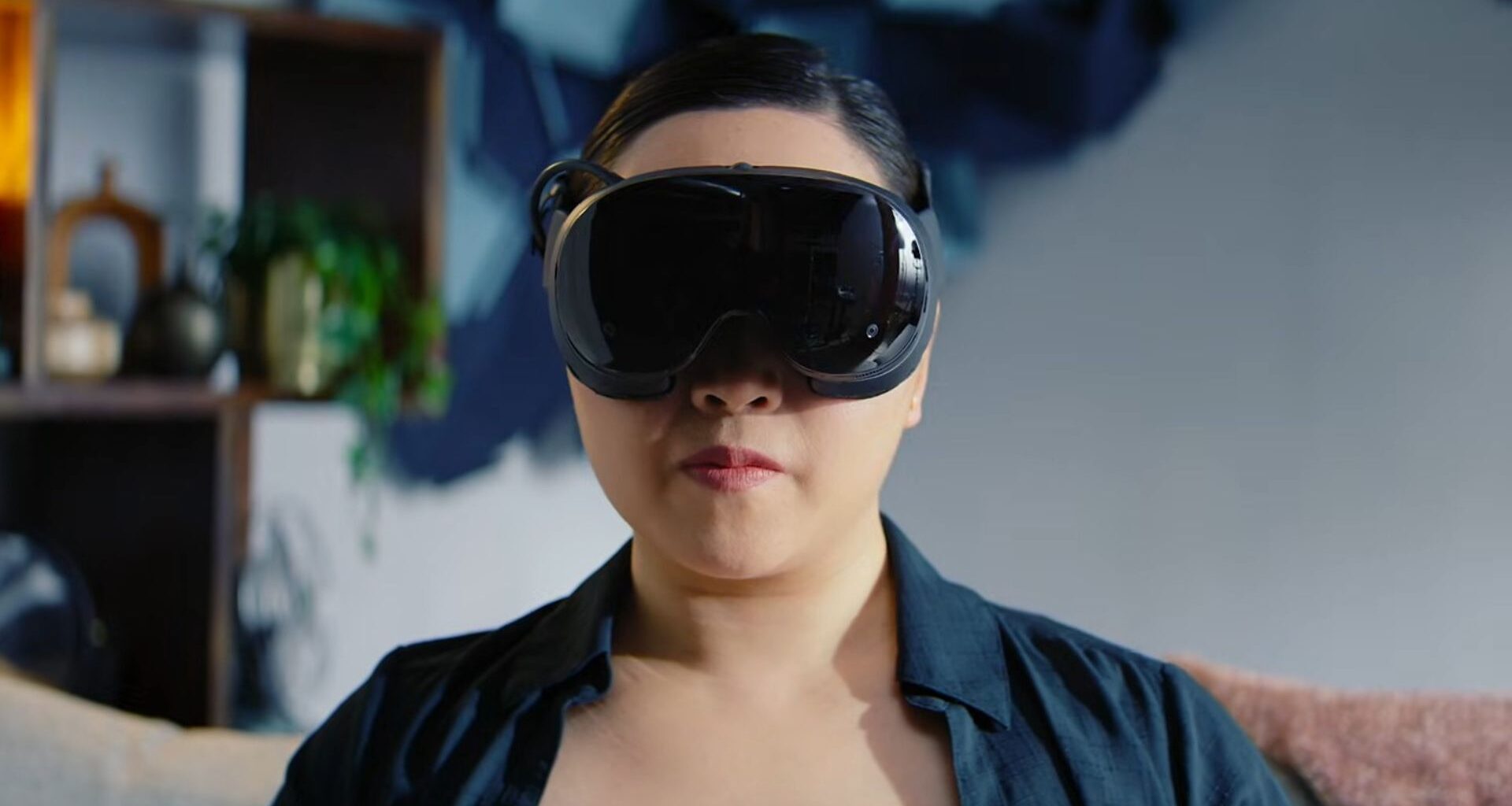 A woman wearing the Steam Frame headset