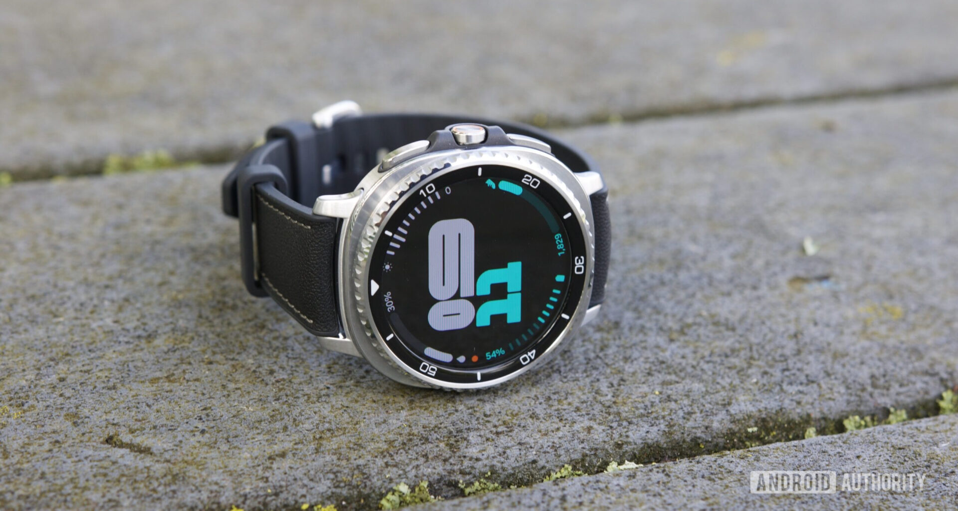 The Galaxy Watch 8 Classic sitting on its side with its display on.