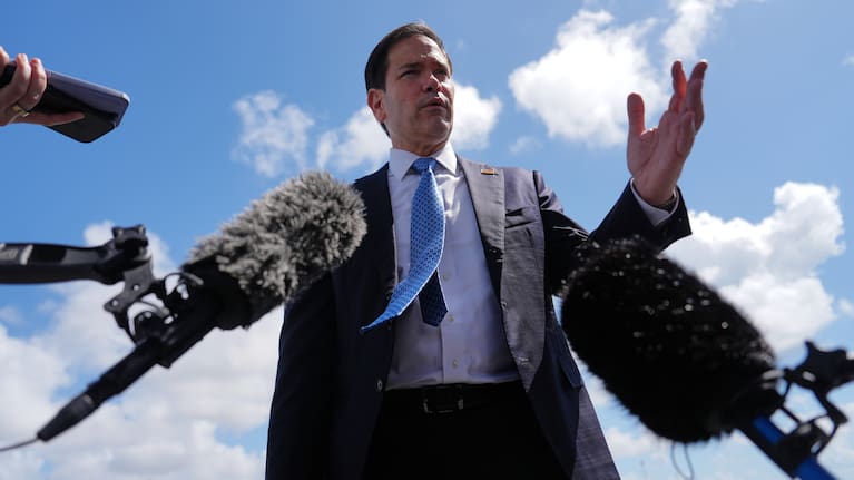 Secretary of State Marco Rubio talks to the press.
