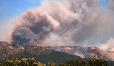 More than 200,000 people flee raging wildfires in France, Spain