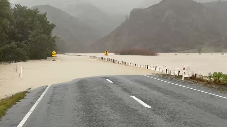 State Highway 1 flooded by the Conway River.