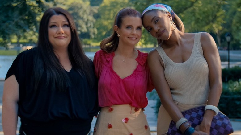 Dana Sue Sullivan, Maddie Townsend, and Helen Decatur standing outside together in Sweet Magnolias