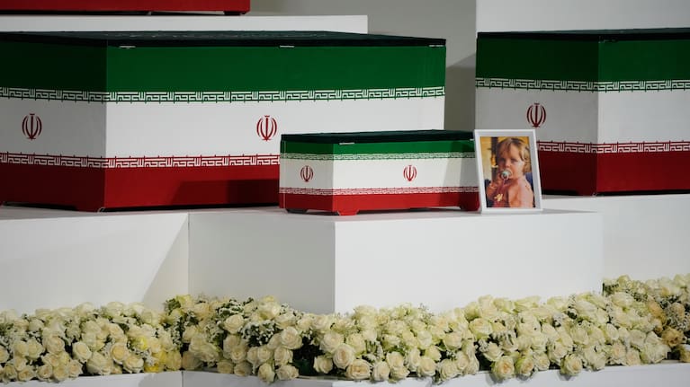 The casket of slain Iranian Supreme Leader Ayatollah Ali Khamenei's granddaughter, Zahra Mohammadi Golpayegani, is displayed alongside the caskets of Khamenei and other members of his family during a viewing ceremony.