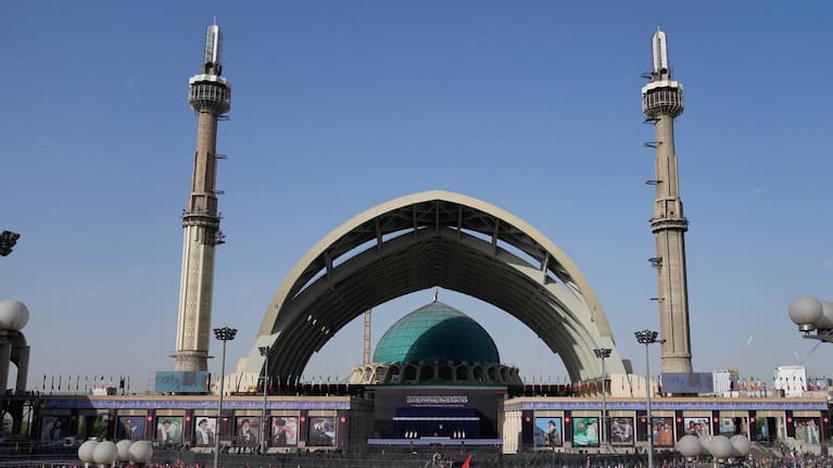 The coffins of slain Iranian Supreme Leader Ayatollah Ali Khamenei and members of his family are displayed on a stand at the start of the dayslong funeral ceremonies at the Imam Khomeini Mosalla Grand Mosque in Tehran, Iran.