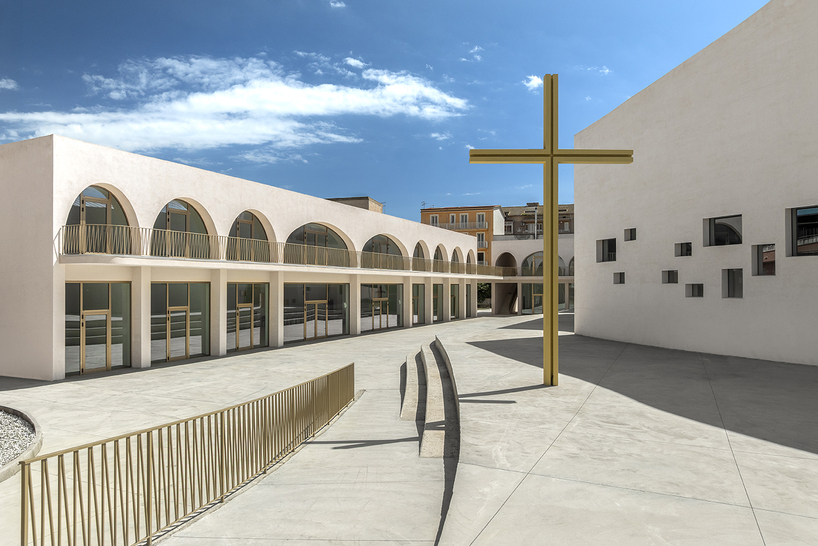 a flowing roof and fluid concrete walls frame the new santa barbara parish complex in sicily - 3