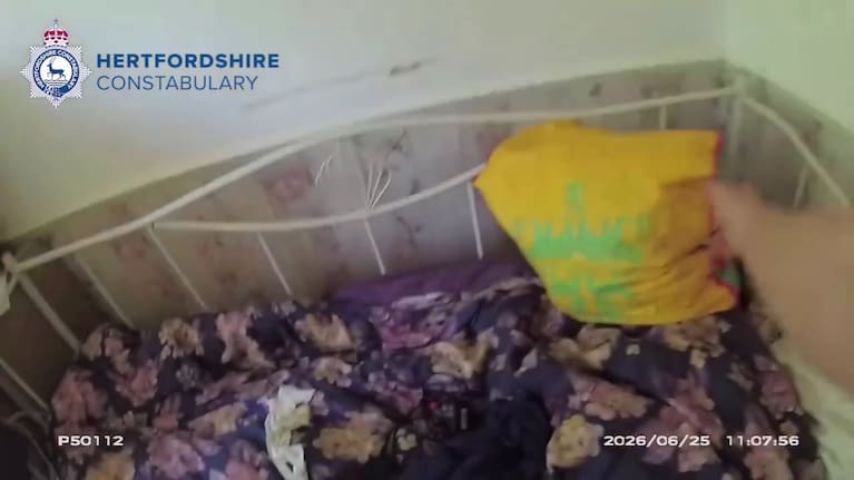 The officer noticed a bag on top of a piece of furniture.
