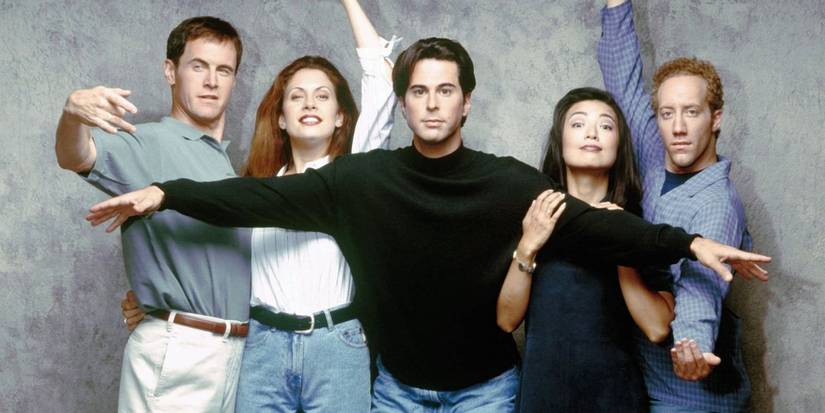 Promo image for The Single Guy with the cast in front of a marbled backdrop.