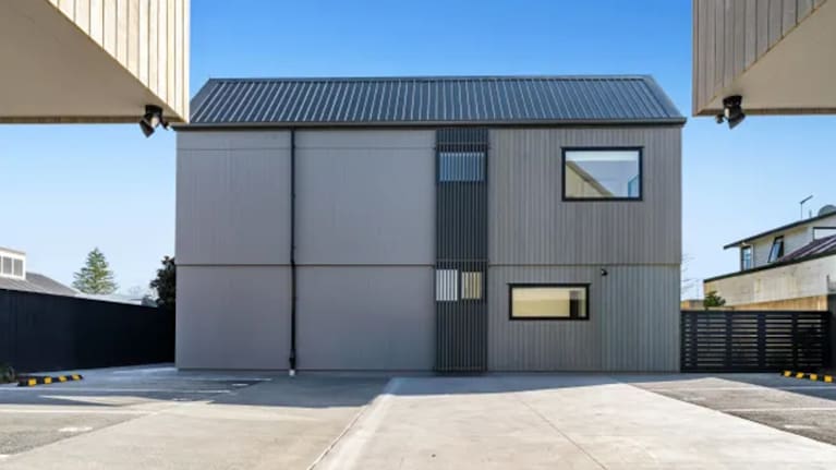 This photo of a real estate property has been digitally enhanced by AI to remove rubbish bins. (Source: Supplied / BuildVision)