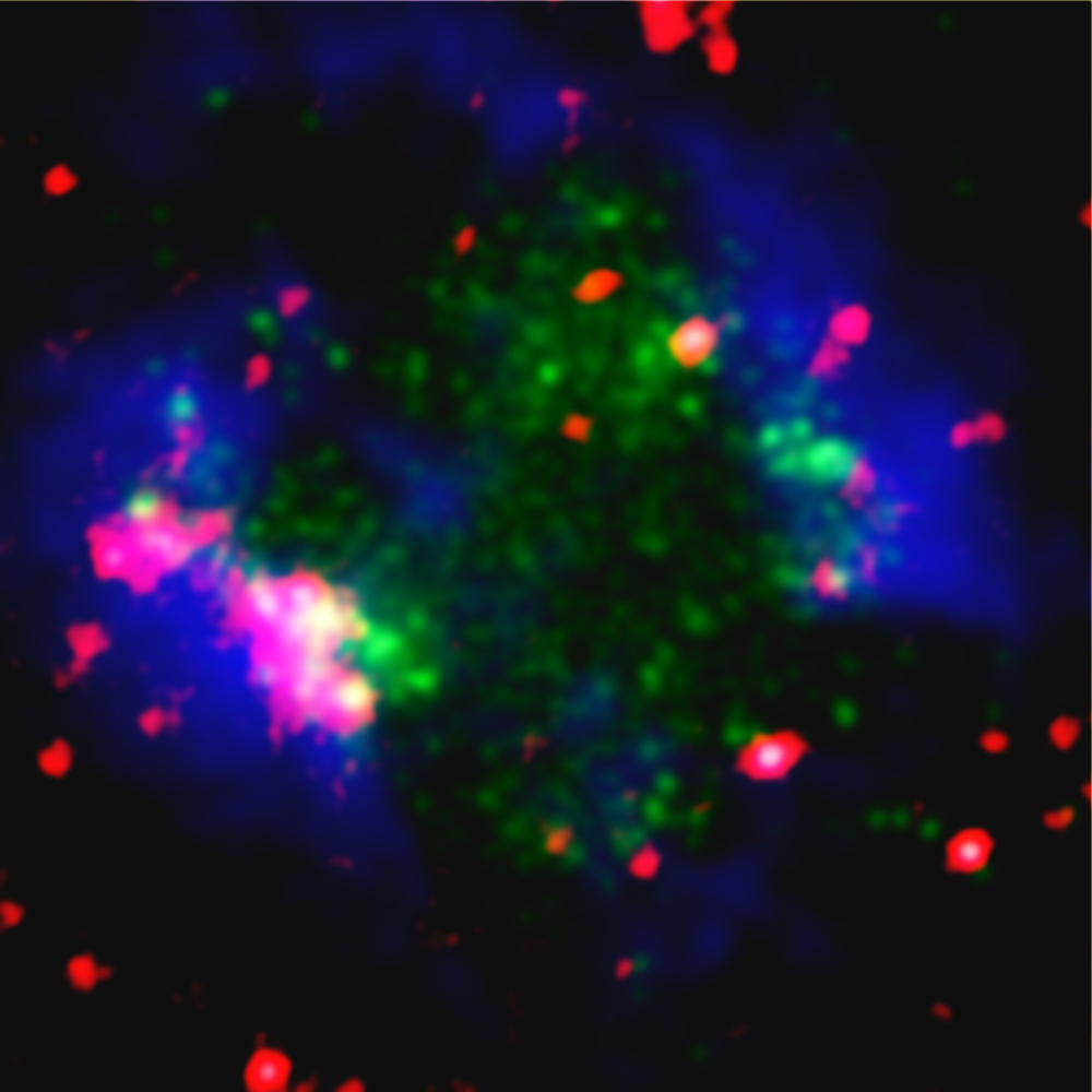 An image of the galaxy Sextans A where Red indicates the infrared emission of dust, blue the emission of atomic hydrogen gas, and green the far-ultraviolet emission created by newly formed stars.
