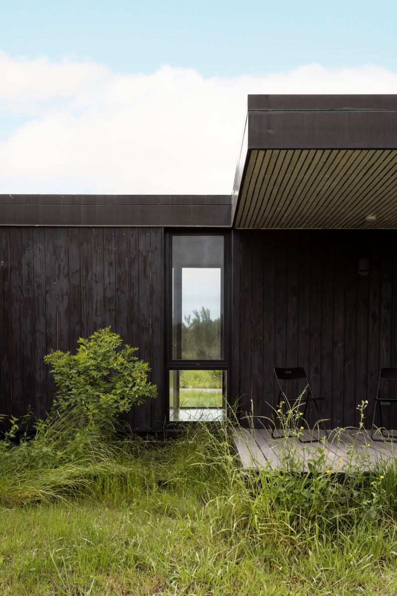 monolithic brick volumes wrap weekend house around a series of courtyards in argentina - 6