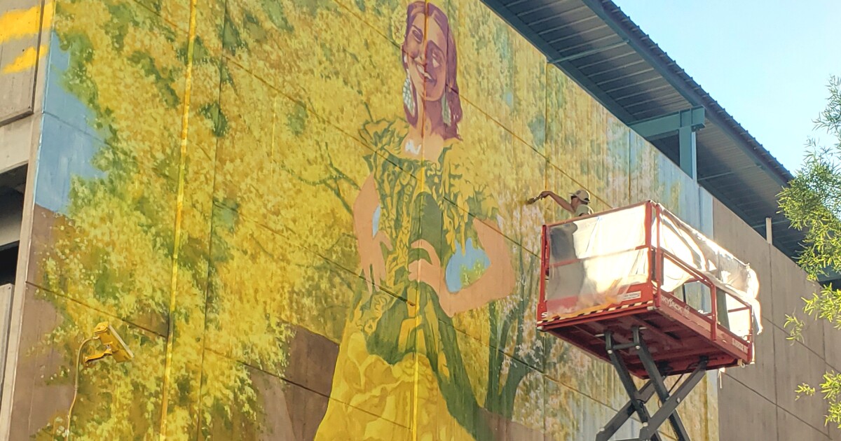 Watch Tucson artist Ignacio Garcia bring three-story 'Paula' mural to life