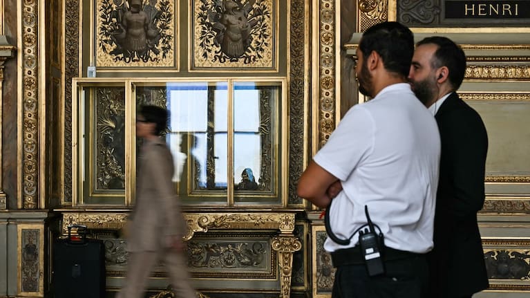 Visitors arrive during the reopening to the public of the Apollo Gallery, at the Louvre museum in Paris, Wednesday, July 22, 2026. (Source: Lou Benoist/Pool Photo via AP)
