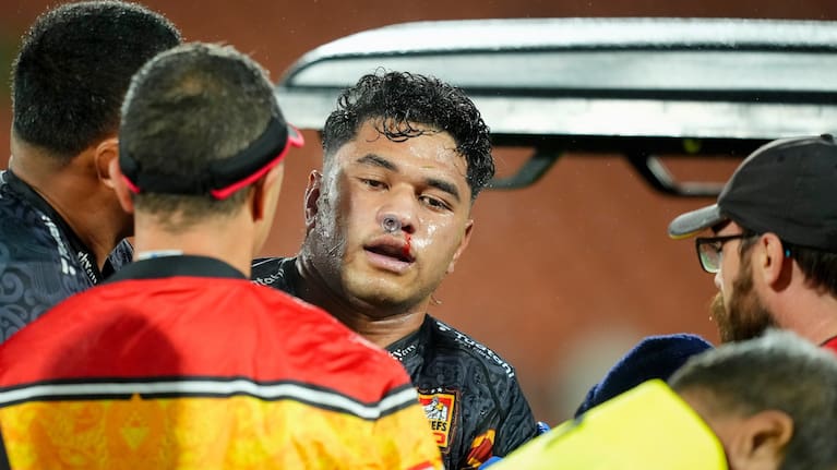Wallace Sititi is taken from the field after being concussed against the Reds.