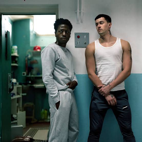 David Jonsson and Tom Blyth wearing prison clothes in Wasteman
