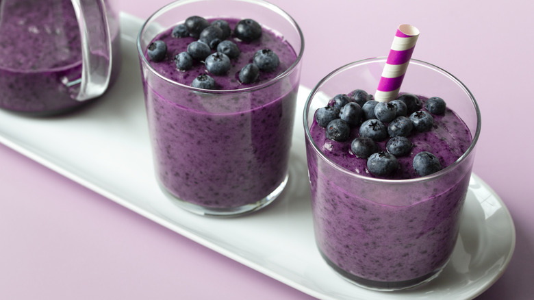 blueberry smoothies with whole blueberry garnishes