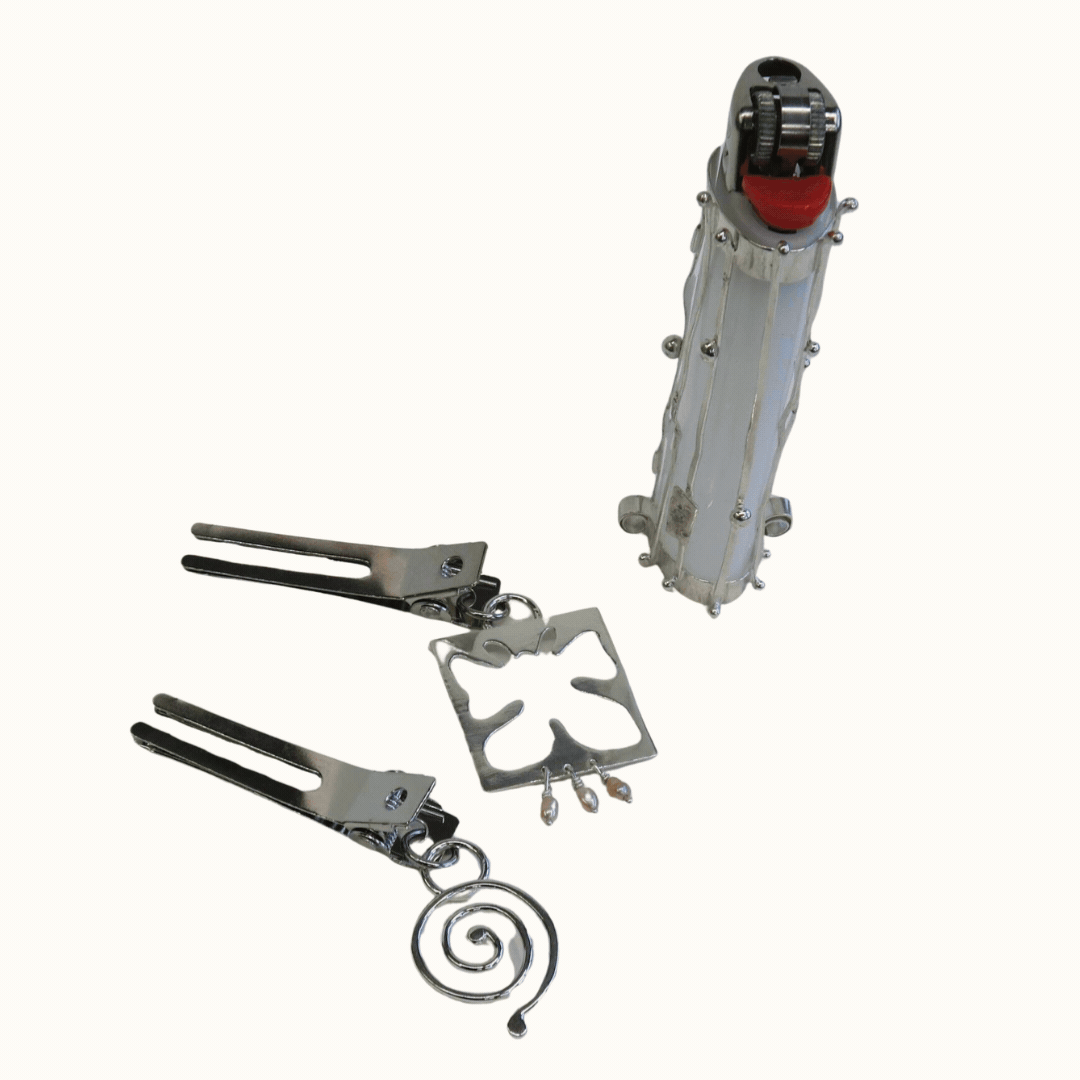 a gif of silver hair pins and a lighter holder
