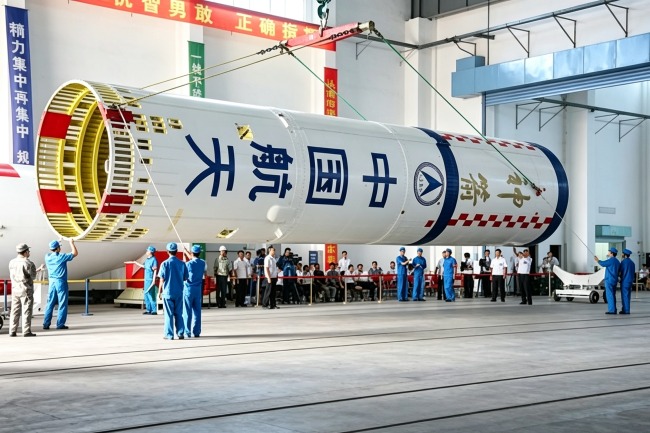 Chinese aerospace personnel assembling a Long March rocket