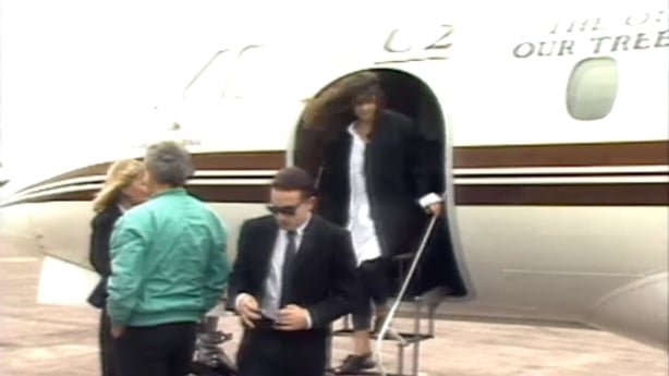 Bono and his wife Ali Hewson emerge from a plane in Cork in 1987
