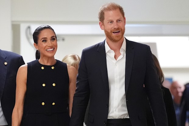 Meghan, Duchess of Sussex and Prince Harry, Duke of Sussex visit the Royal Children's Hospital on April 14, 2026 in Melbourne, Australia. 