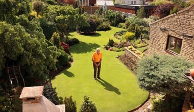Stuart Grindle from Tickhill, Doncaster who has a competition winning garden that he is managing to keep luscious green in the heatwave