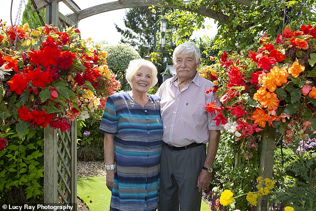 The garden takes hours of work to maintain, by Stuart, pictured with his wife Anne in 2018