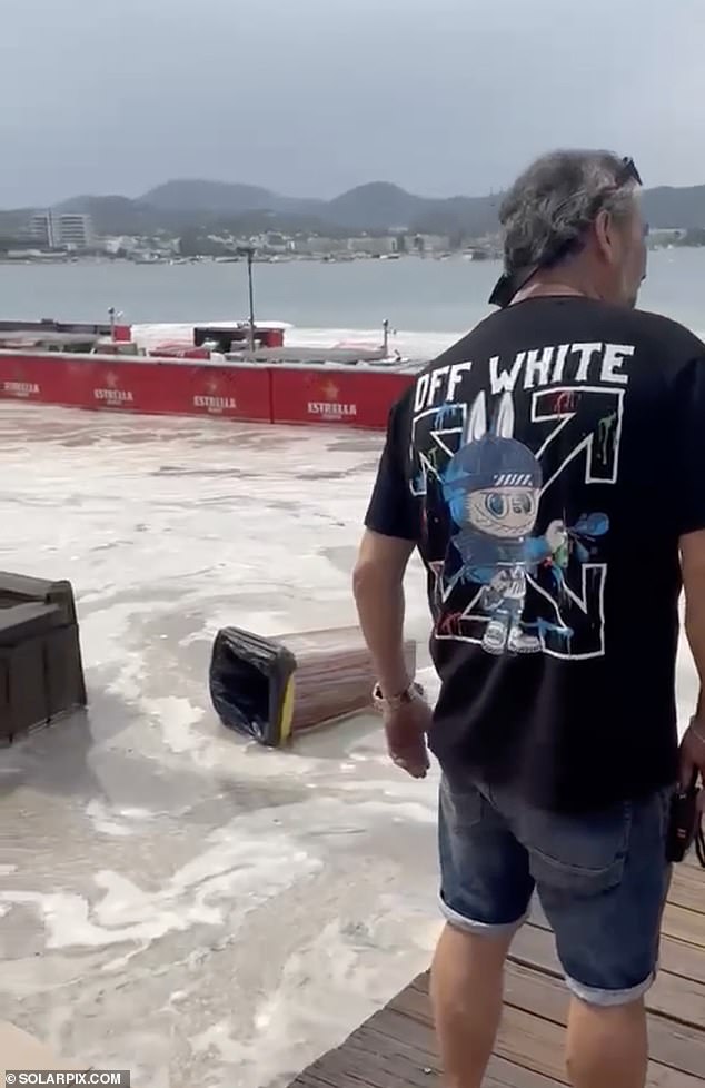 The area was supposed to host a concert on Monday evening, however, was left covered by seawater that swept away containers, coolers and bars installed for the event