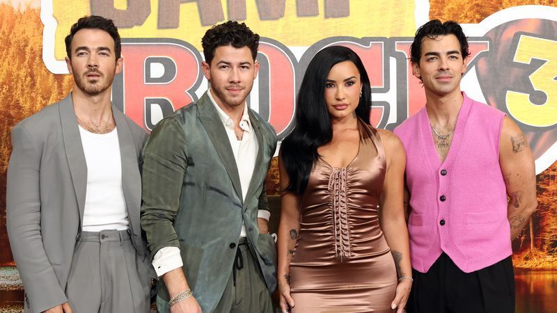 BURBANK, CALIFORNIA - AUGUST 10: (L-R) Kevin Jonas, Nick Jonas, Demi Lovato and Joe Jonas attend the Los Angeles premiere of Disney's "Camp Rock 3" at Walt Disney Studios on August 10, 2026 in Burbank, California. (Photo by Monica Schipper/Getty Images)