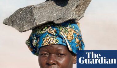 A Ugandan quarry worker carrying rocks on her head: Dan Nelken’s best photograph | Art and design
