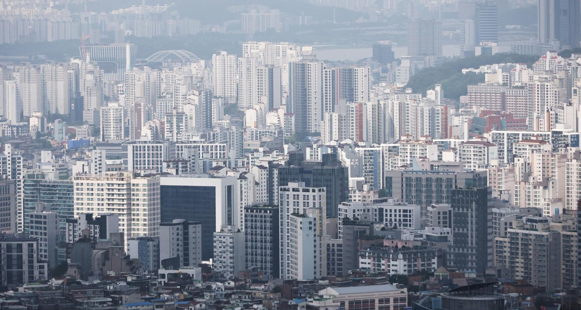 Apartment buildings are seen in Seoul from Namsan, July 19. Yonhap