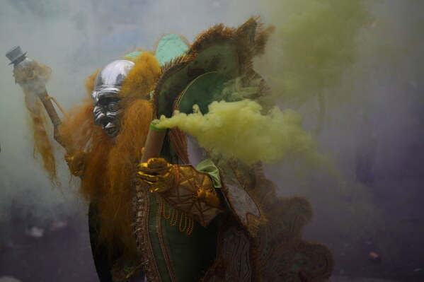 A "Morenada" dancer performs in the annual parade honoring the "Lord of Great Power", in La Paz, Bolivia, Saturday, Aug. 1, 2026. (AP Photo/Juan Karita)
