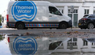 Thames Water infrastructure with pipes and maintenance workers, highlighting water management efforts in London