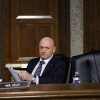 Senator Mark Kelly takes his seat during a Senate Armed Services Committee confirmation hearing on Capitol Hill on January 15, 2026.