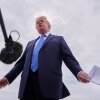 President Donald Trump speaks with reporters before boarding Air Force One, Friday, Aug. 14, 2026, at Joint Base Andrews, Md.