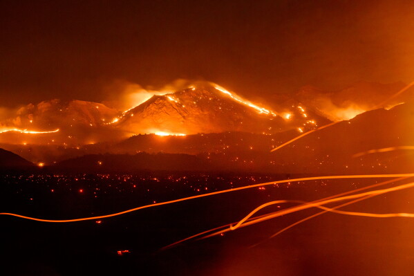 The Bug Fire burns near Doyle in unincorporated Lassen County, Calif., Aug. 13, 2026. (AP Photo/Noah Berger, File)