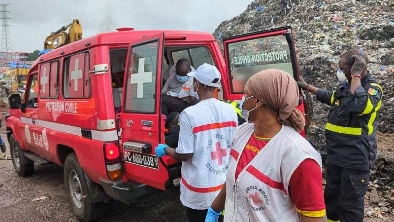 A landslide at a landfill in the capital of Guinea kills 30 people, officials say