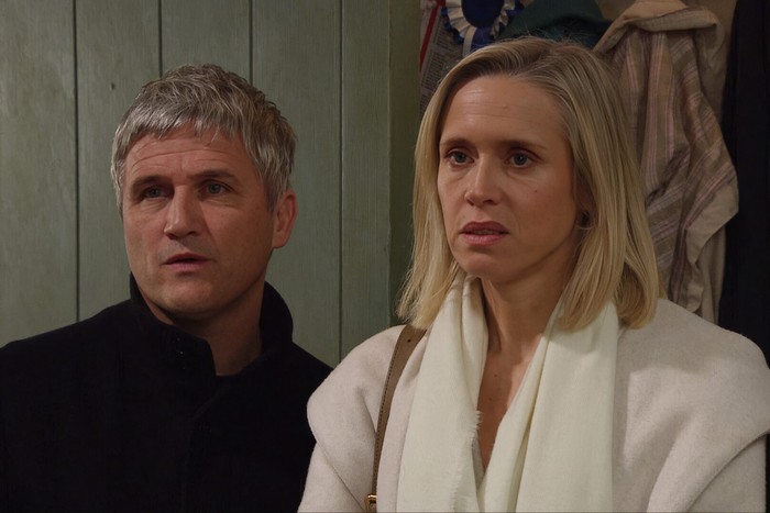 18_02_emm_cain_ruby_03 Ruby and Caleb look shocked, stood in the Butler's Farm kitchen, in a scene from Emmerdale