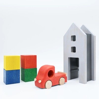 Low-Tech Toy Design: This Tuminy Truck Lets Kids Unload Goods