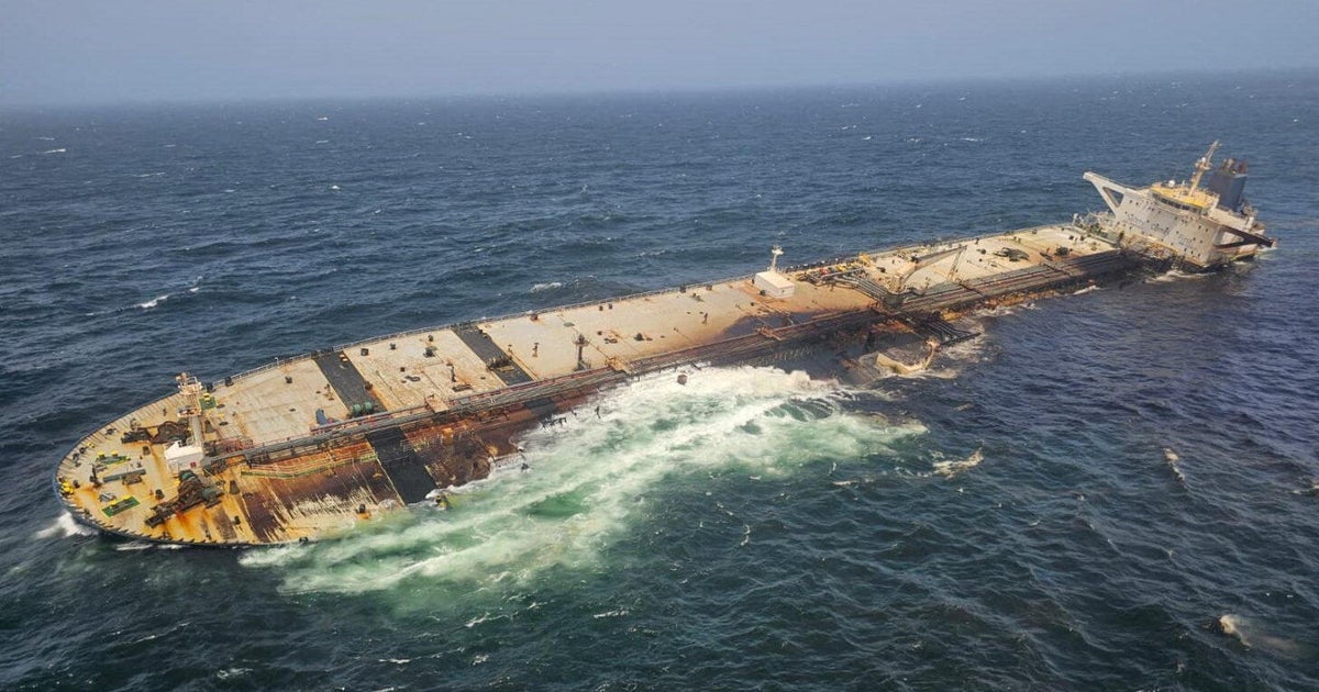 The damaged and half sunk oil tanker Caroline Bezengi, at sea off the coast of Oman