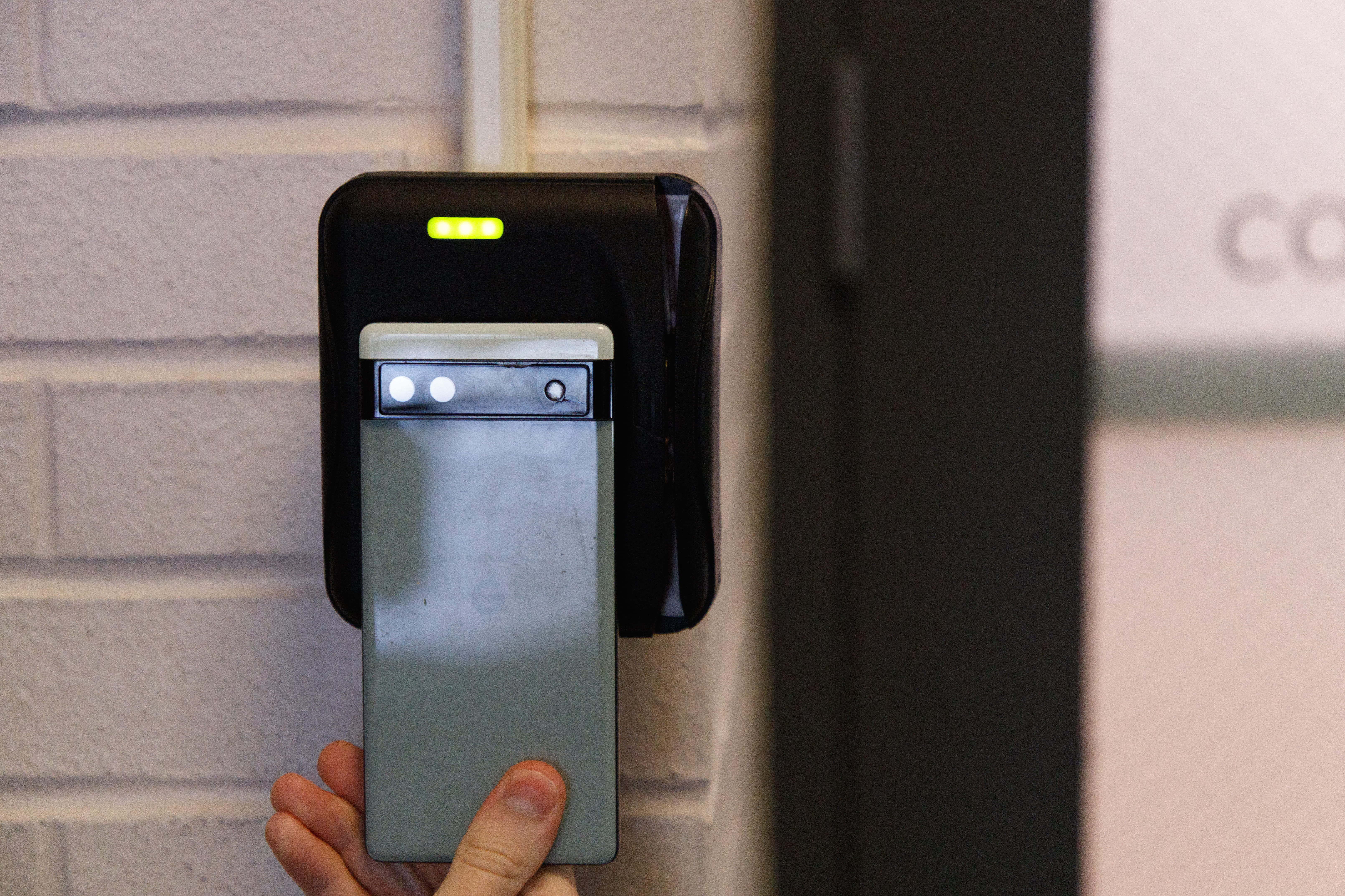 A student uses their digital BuckID to unlock a door on campus (Posed). Credit: Michael Goulet | Campus Photo Editor.